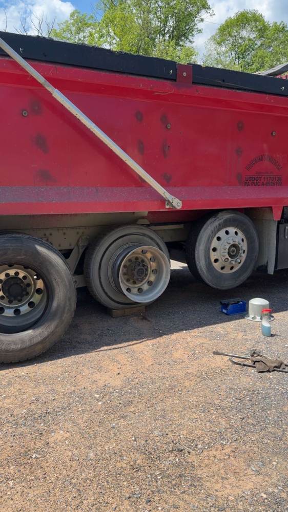 Commercial truck tire removed from the axle for repair
