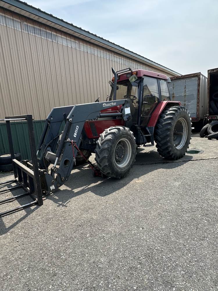 Case farm tractor serviced on-site for ag tire work